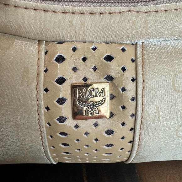 MCM Mini Top Handle Bag
Champagne Monogram Leather - Picture 11 of 15